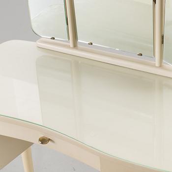 A DRESSING TABLE, STOOL AND A PAIR OF BEDSIDE TABLES, second half of the 20th century.