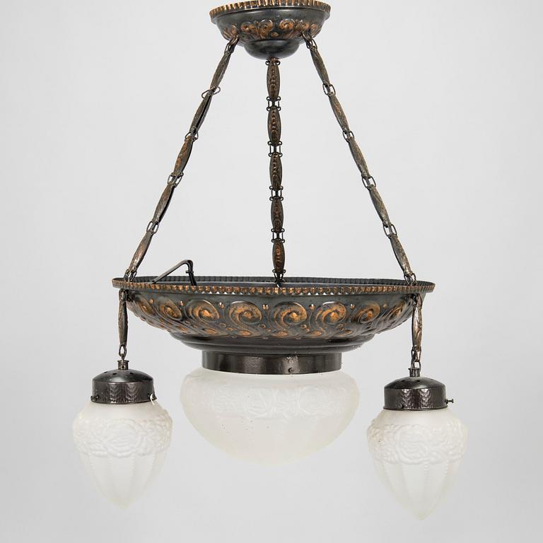 An early 20th-century Jugend style pendant ceiling light.