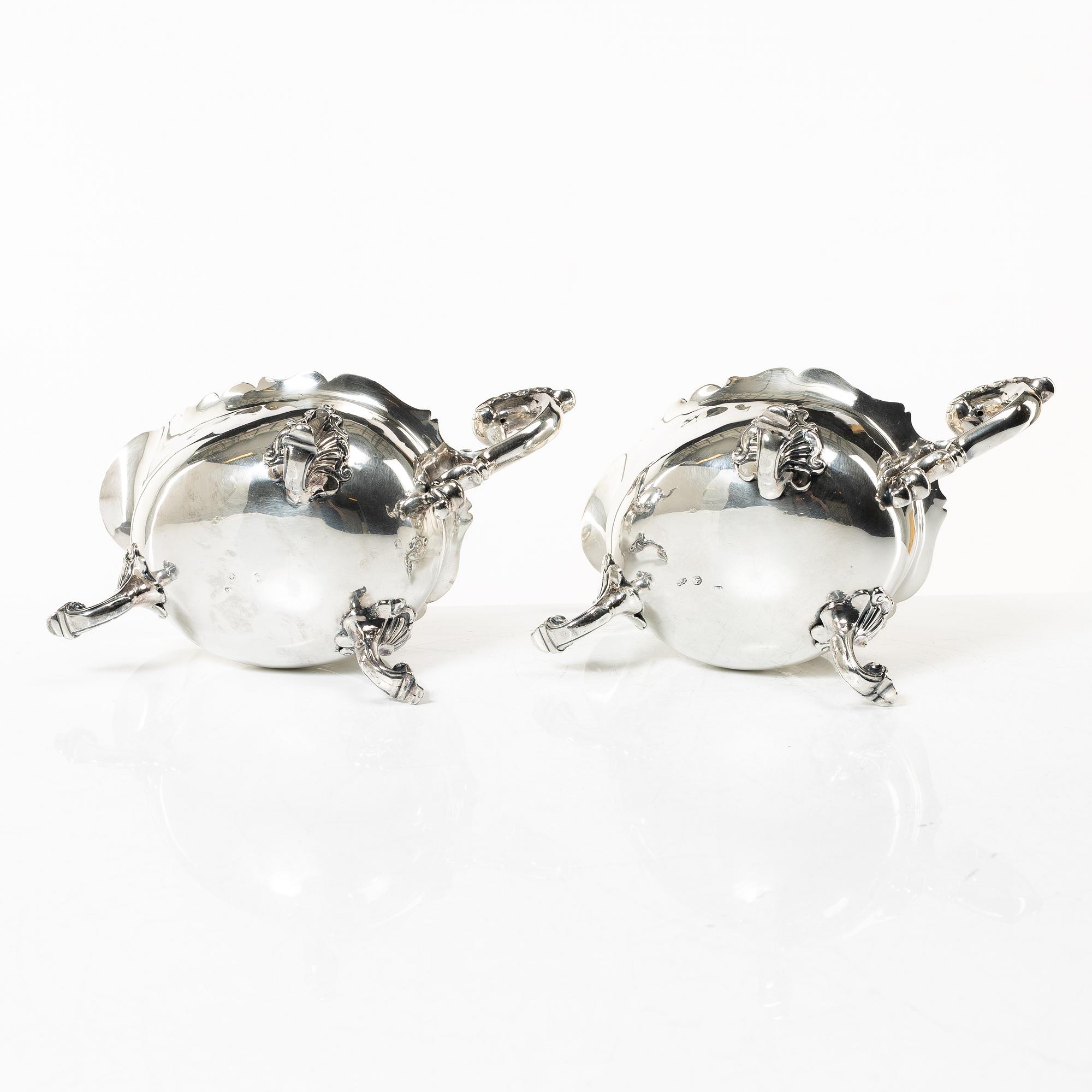 A pair of 18th century silver sauce boats, Richard William, Ireland, spoons, Peter & William Bateman, London 1807.