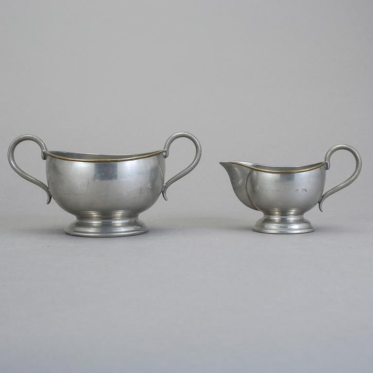 MJÖLKKANNA samt SOCKERSKÅL, två delar, tenn, Svenskt Tenn, 1900-talets första hälft / mitt.