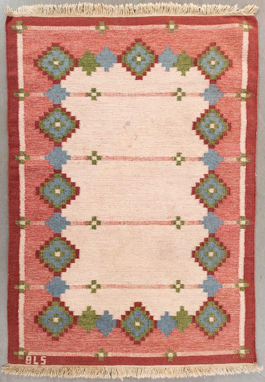 A Swedish flat weave carpet signed ca 200 x 143 cm.