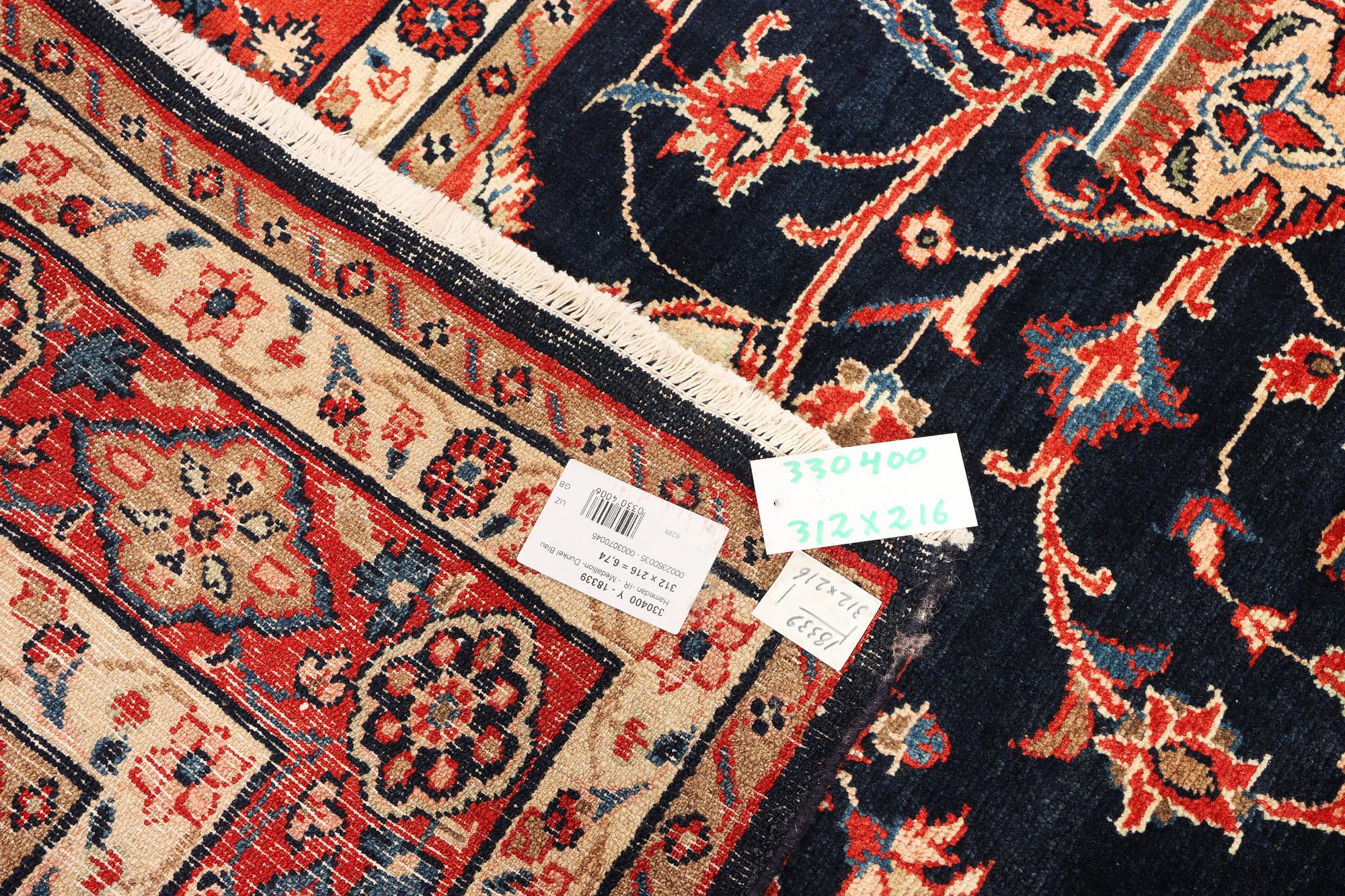 A Hamadan carpet, c. 312 x 216 cm.