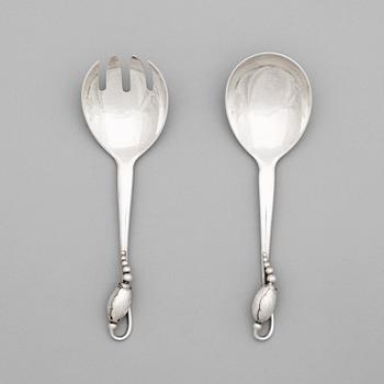 556. A pair of Georg Jensen sterling 'Blossom' salad
servers, Copenhagen 1945-77.