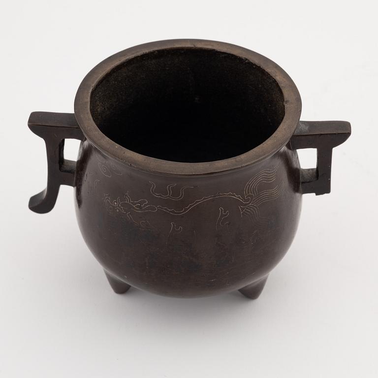 A Chinese tripod bronze censer, 20th century.