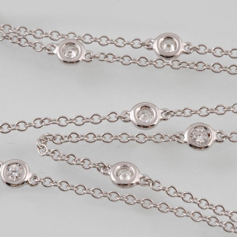 COLLIER, 18K vitguld med 15 briljantslipade diamanter ca 0.70 ct, Milano, Italien. Vikt 5,8 gram.