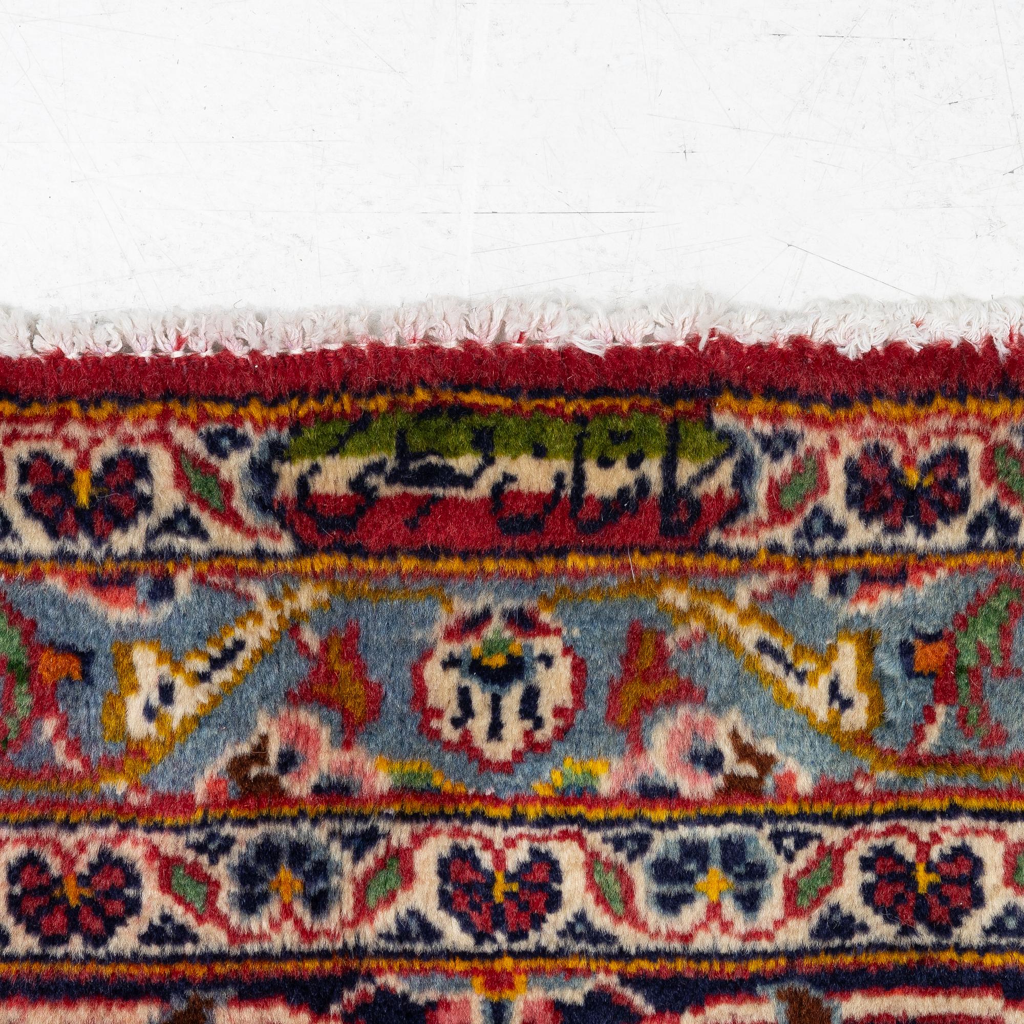 A Keshan carpet, central Iran, signed c, 392 x 301 cm.