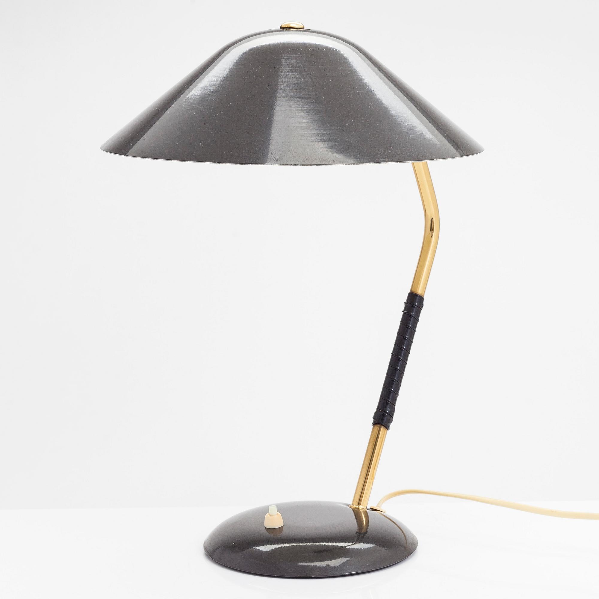 A mid 20th- century tamble lamp for Valinte.