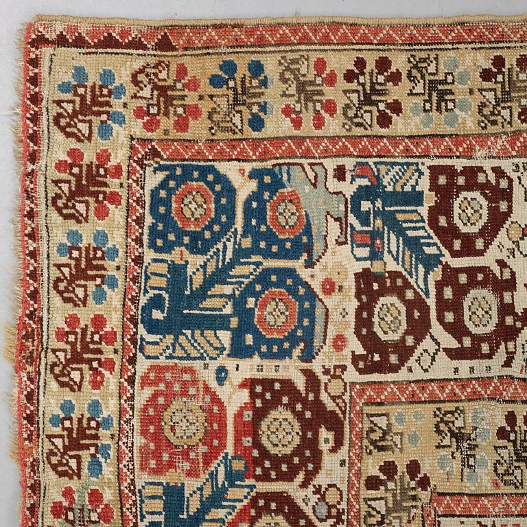 A RUG, an antique Gördes (Ghiordes) prayer rug, second half of the 18th century, ca 167-170 x 120-123 cm.