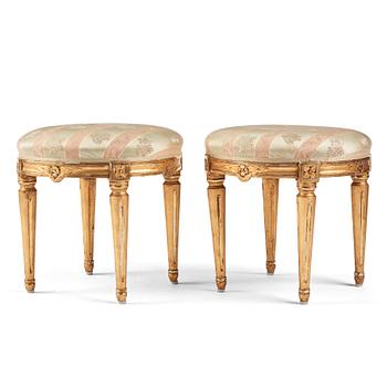 64. A pair of Gustavian stools.