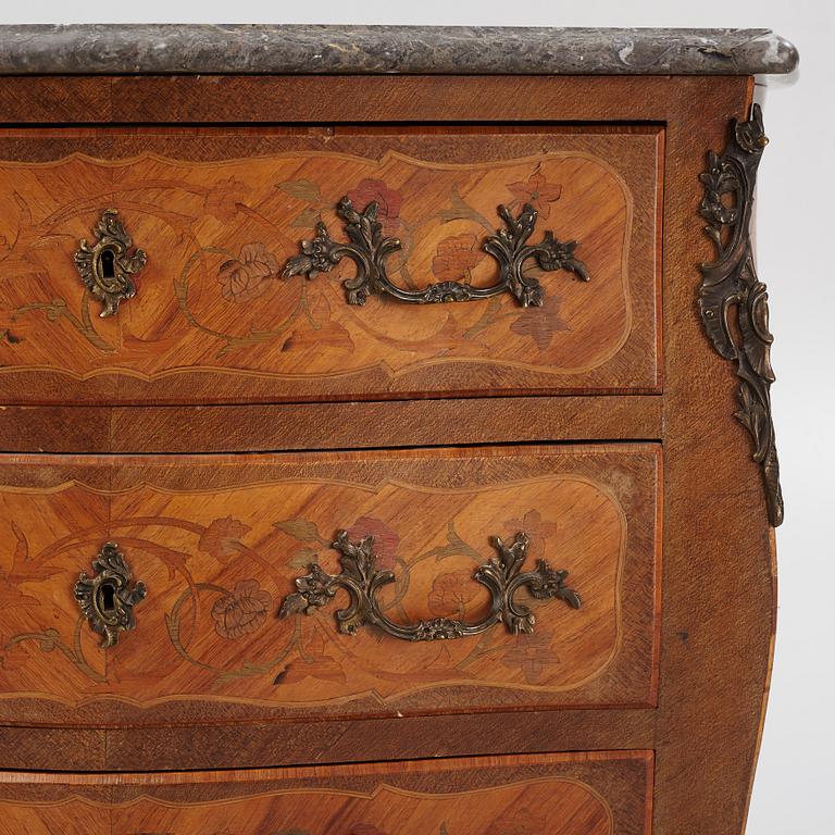 A Louis XV-style marquetry commode, first part of the 20th century.