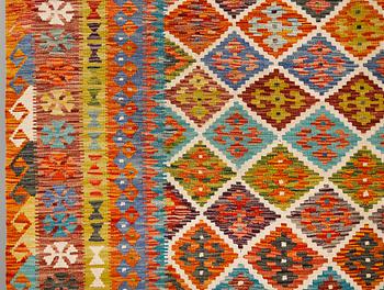 A kilim carpet, approximately 353 x 246 cm.