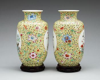 A pair of famille rose vases, presumably Republic, first half of 20th Century with Hongxians mark.