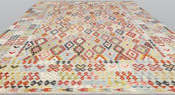 A kilim carpet, c 497 x 359 cm.