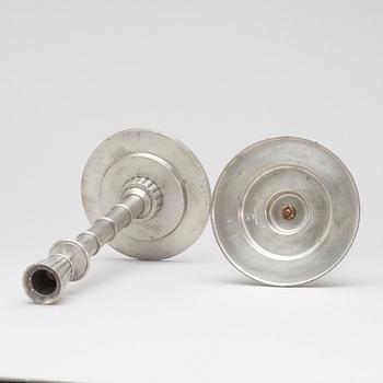 A pair of Erik Fleming pewter candlesticks by Norrahammars Bruk, Sweden 1931.
