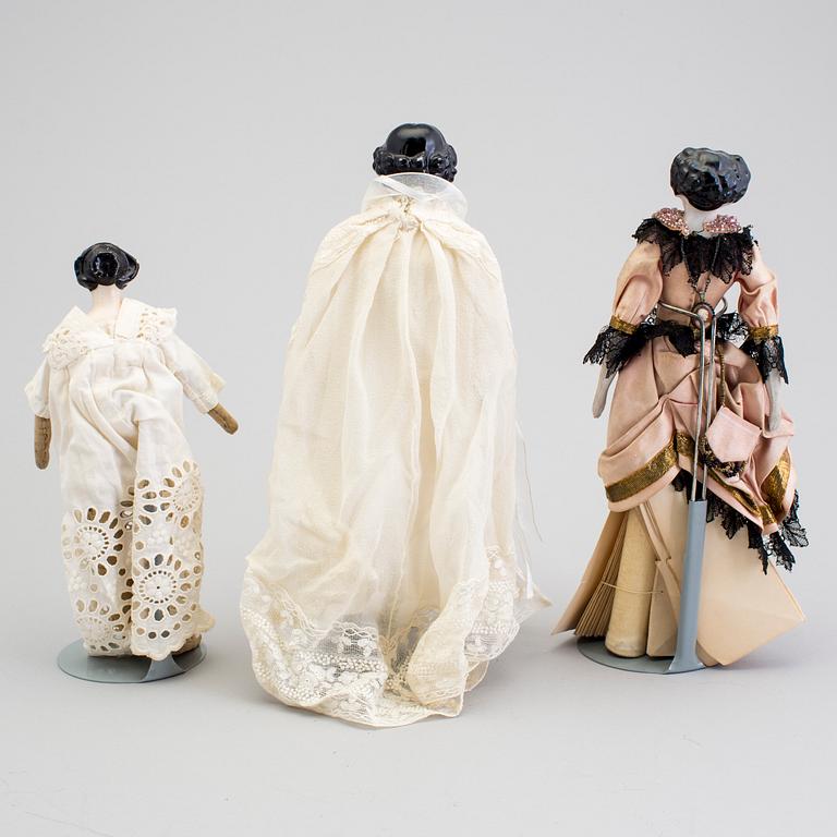 A lot of 12 dolls and doll heads in porcelain Germany early 20th century.