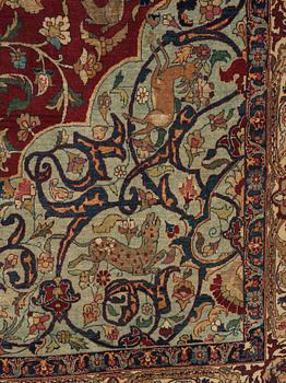 A CARPET, A semi-antique Esfahan part silk, ca 350,5 x 233,5 cm.