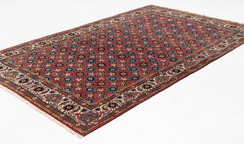 A semi-antique Veramin carpet, ca 338 x 212 cm.