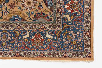 A semi-antique Tabriz carpet of vase design, West Persia, c. 404 x 292 cm.