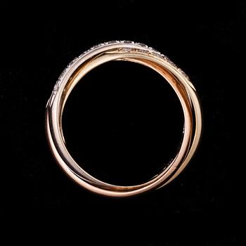 RING, 14K guld i tre färger, briljantslipade diamanter tot. ca 0,20 ct. Finska importsämplar. Vikt 4,9 g.