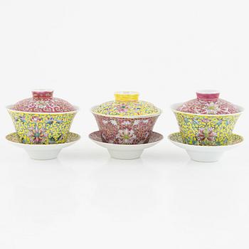 A group of three Chinese enamelled porcelain cups with covers and stands, three small dishes, 20th century.