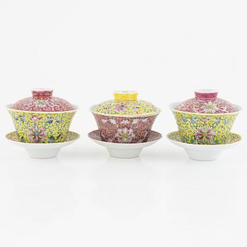 A group of three Chinese enamelled porcelain cups with covers and stands, three small dishes, 20th century.