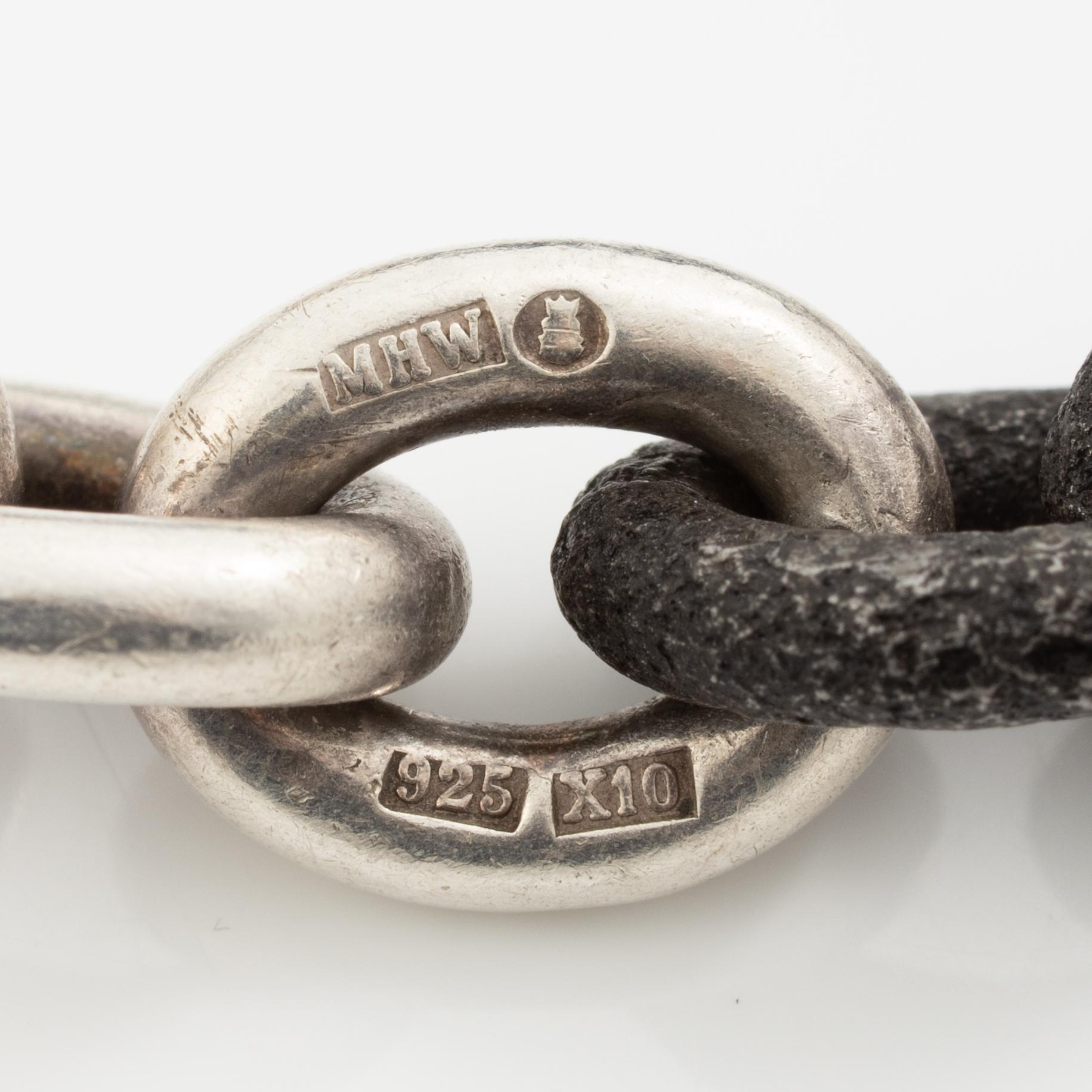 Mikael Hamma, a bracelet 18K gold, sterling silver and oxidised iron, Stockholm 1996.