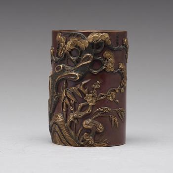 A bronze brush pot, Qing dynasty, with Qianlong seal mark to base.