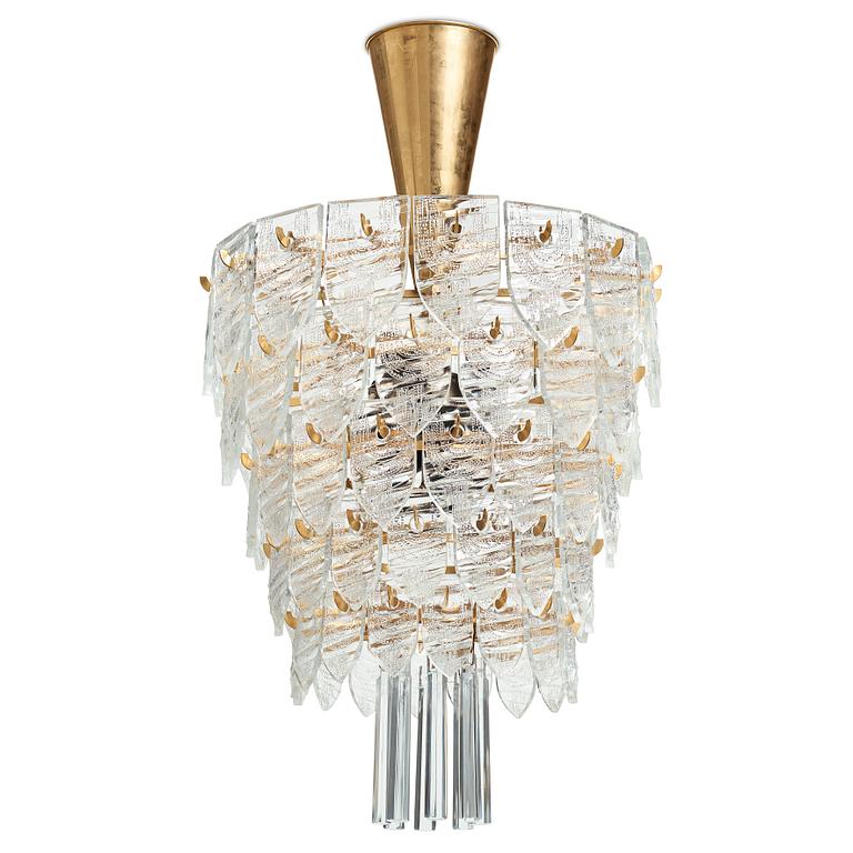 GUNNAR CYRÉN, a glass and gilt bronze chandelier, Orrefors, Sweden 1960's.