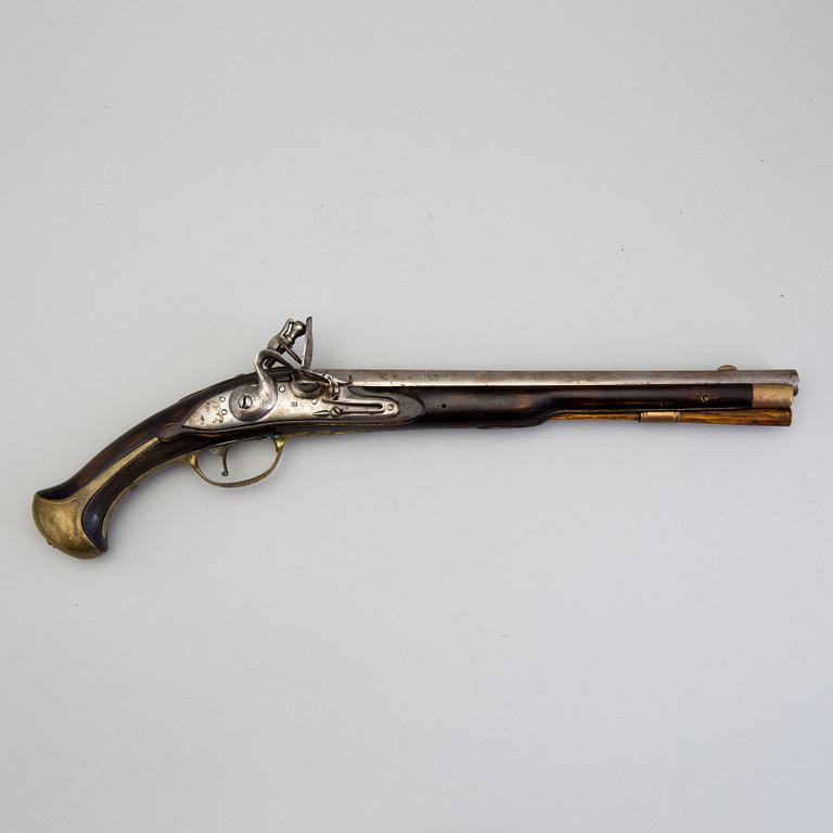 A 18th century flintlock pistol.