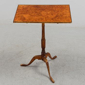 An early 19th century folding table.
