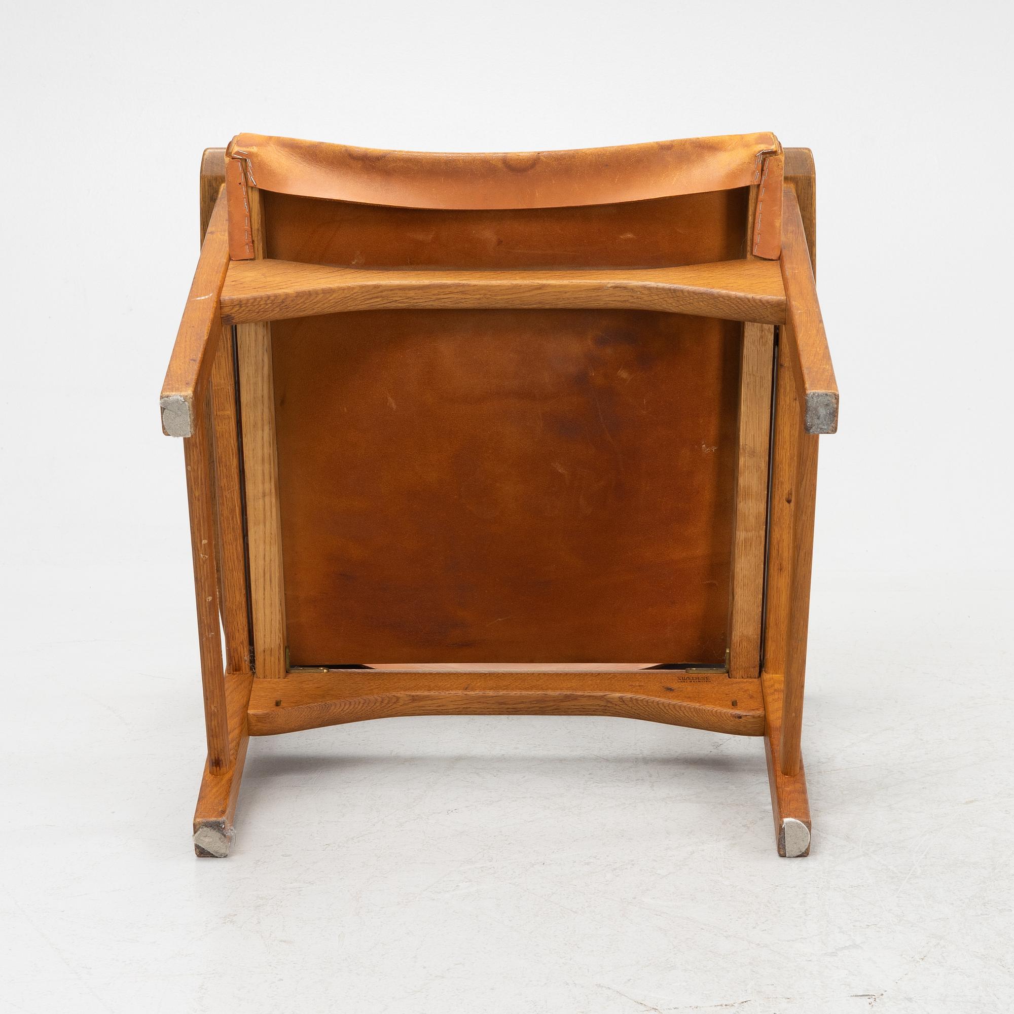 Carl Malmström & Yngve Ekström, a pair of 'Caryngo' oak armchairs, Swedese, second half of the 20th century.