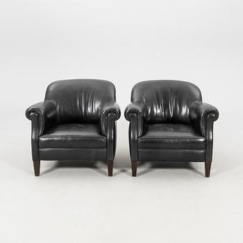 Club armchairs, 1 pair, circa 1900.