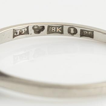 White gold and three brilliant cut diamond ring.
