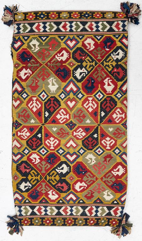 A double-interlocked tapestry carrige cushion, Österlen, Est Scania c. 102 x 53 cm.