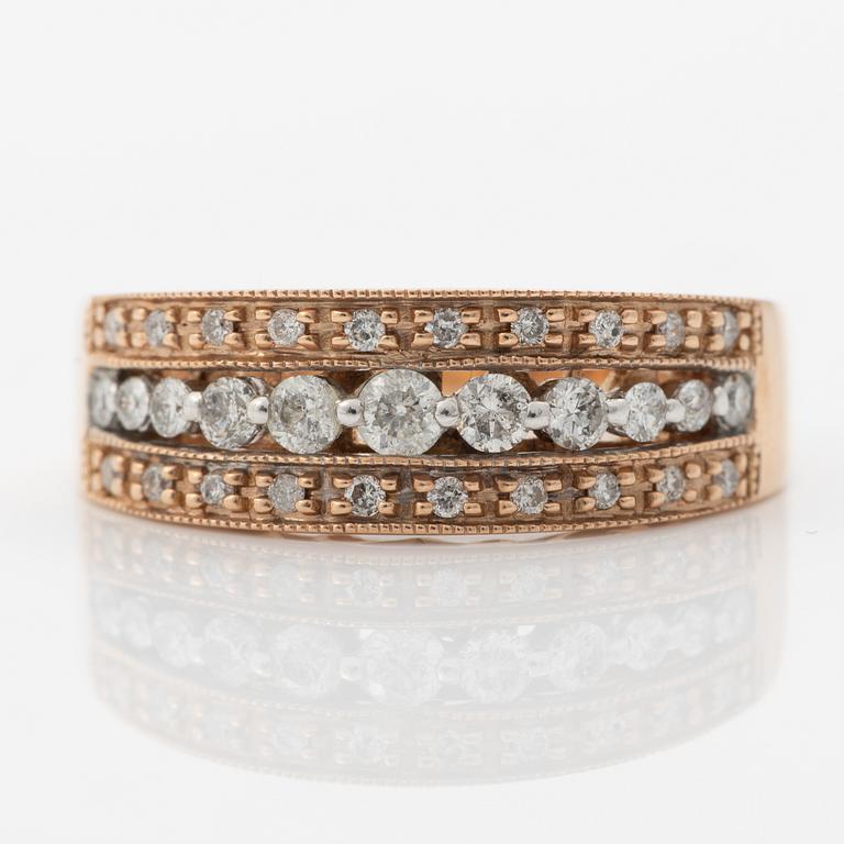 14K rose gold ring with round brilliant-cut diamonds.
