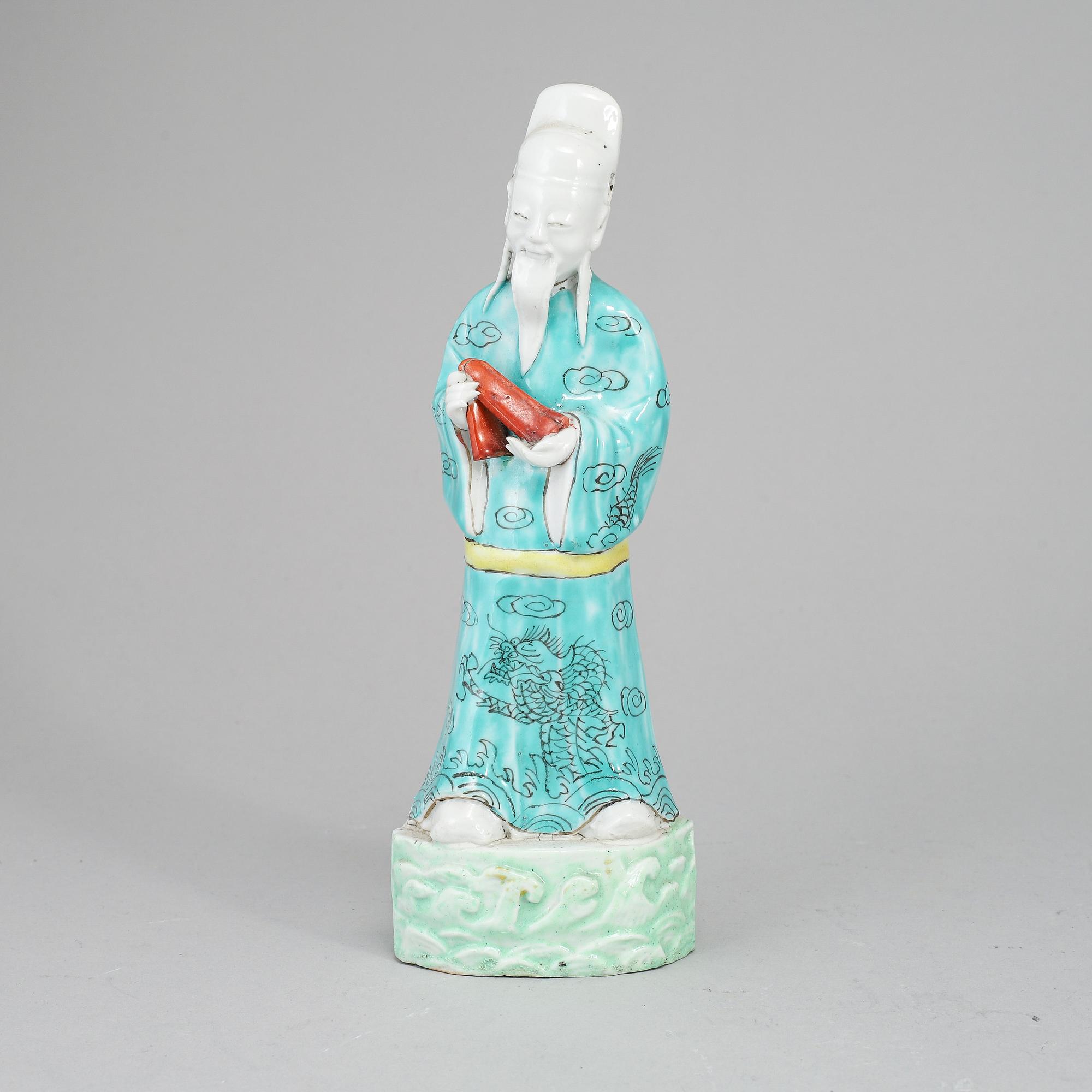 A famille rose figure, Qing dynasty, 19th century.