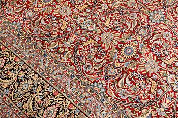A Kirman lavar carpet, 403 x 304 cm.