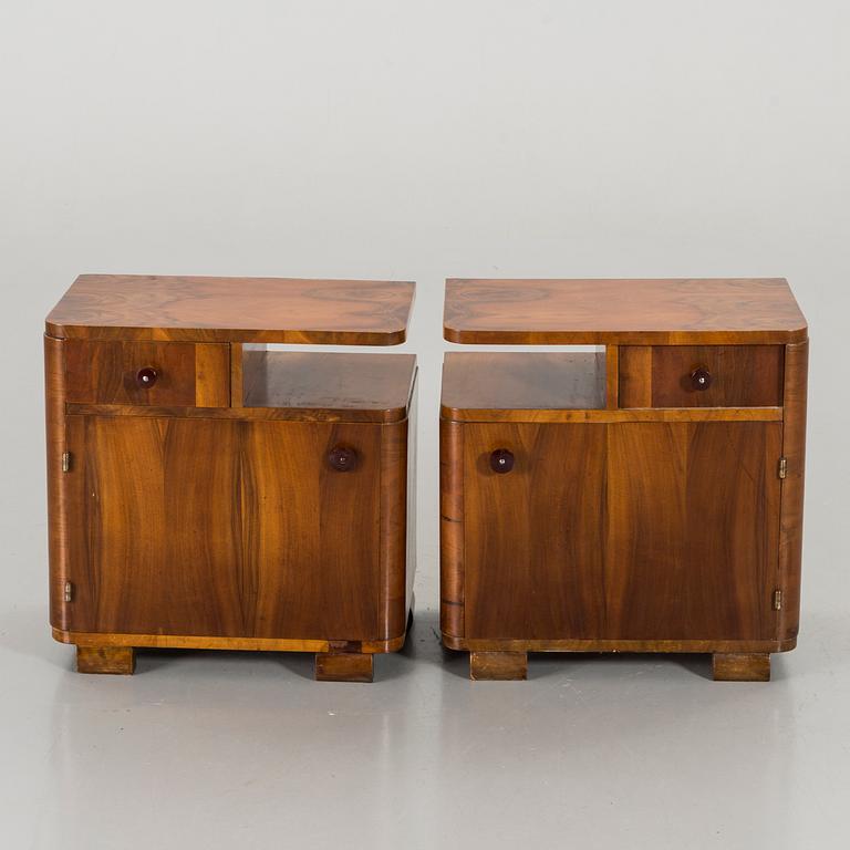 A PAIR OF MID 20TH CENTURY BEDSIDE TABLES.