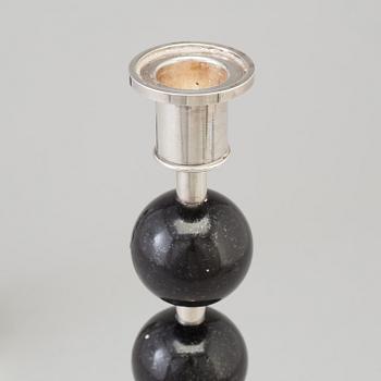 SIGURD PERSSON, a pair of silver plate and diabase candle sticks.