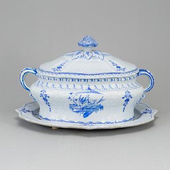 A Swedish Rörstrand faience tureen with cover and stand, 18th Century.