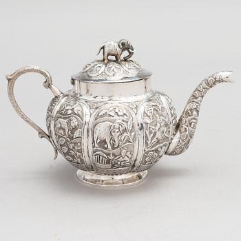 A 3-piece Asian silver tea set, presumably from the mid-20th century.