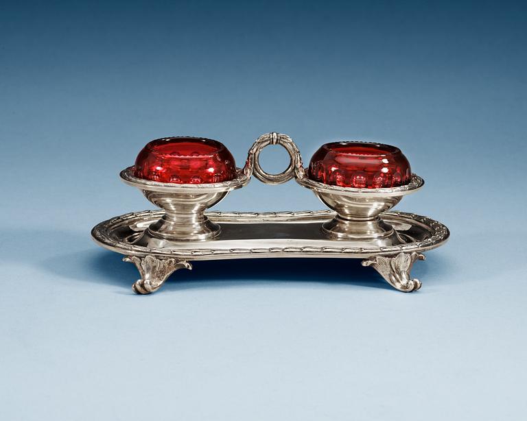 A Russian mid 19th century parcel-gilt and glass salt, makers mark of Nicols & Plinke, St. Petersburg. Imperial Warrant.