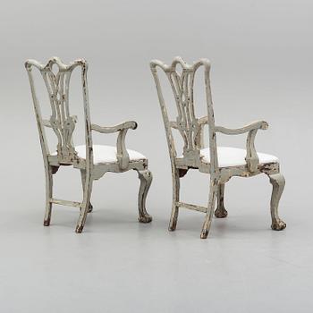 a pair of late 19th century armchairs.