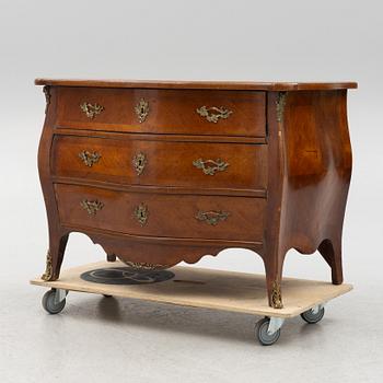 A Rococo chest of drawers, 18th Century.