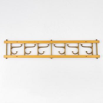 Klädhängare, "Dekorativ", Skogslunds Metallgjuteri, Anderstorp, 1950/60-tal.