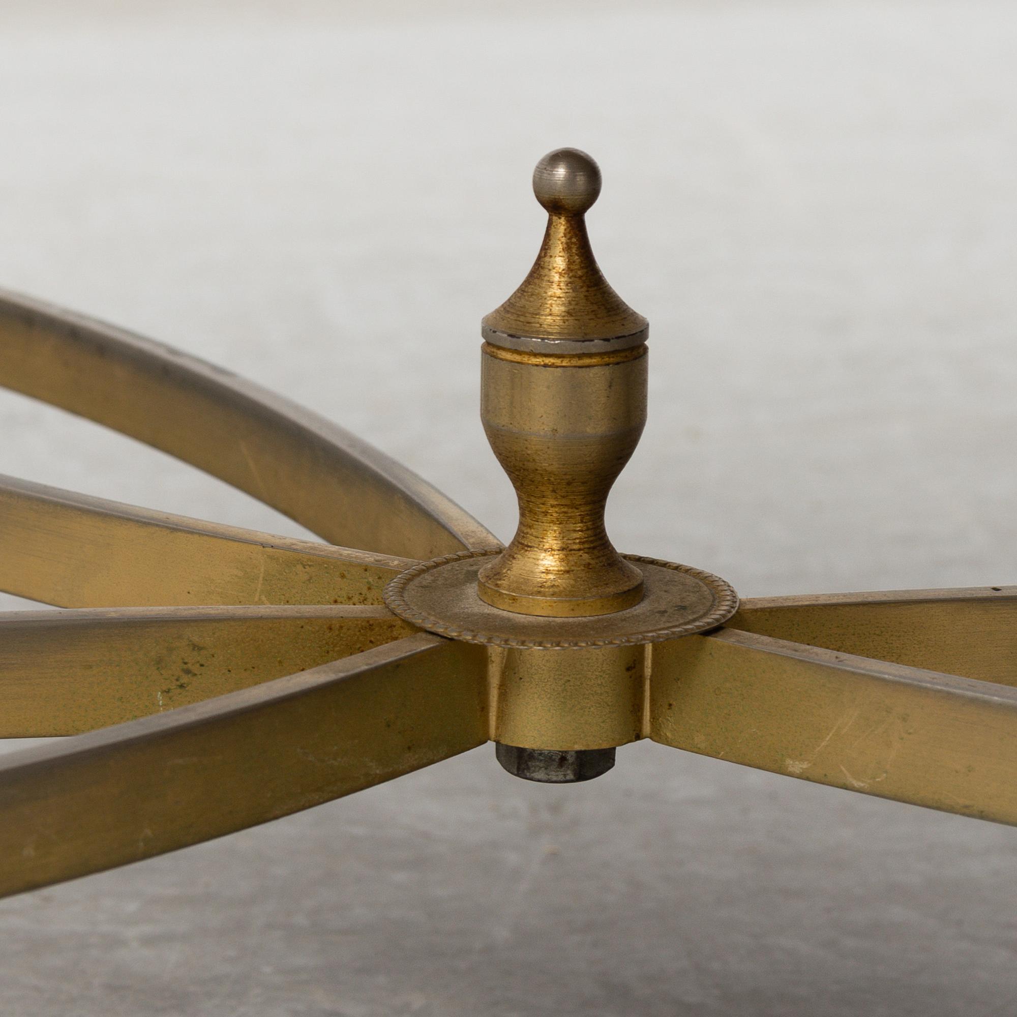 a metal and onyx coffee table from the mid 20th century.
