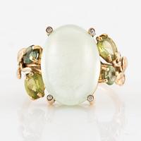 Cocktail ring, Mandelstam, 18K gold set with cabochon-cut prehnite, peridot, green tourmaline, and brilliant-cut diamonds.