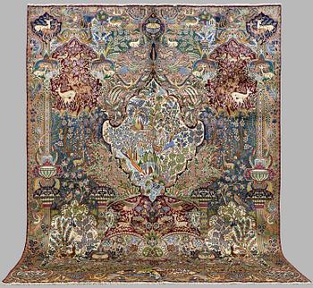 A Kashmar figural carpet. Circa 390 x 300 cm.