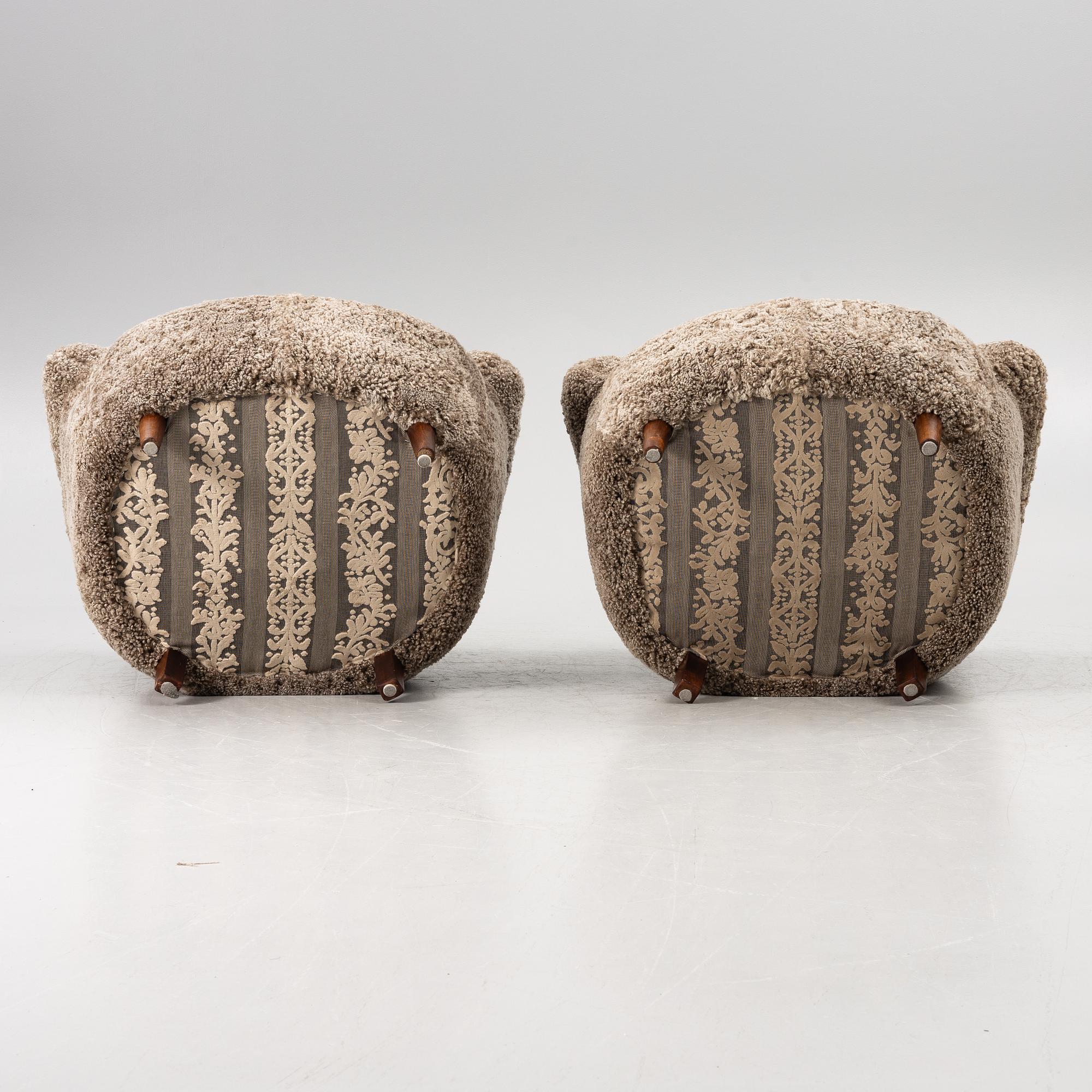 A pair of easy chairs, mid-20th century.