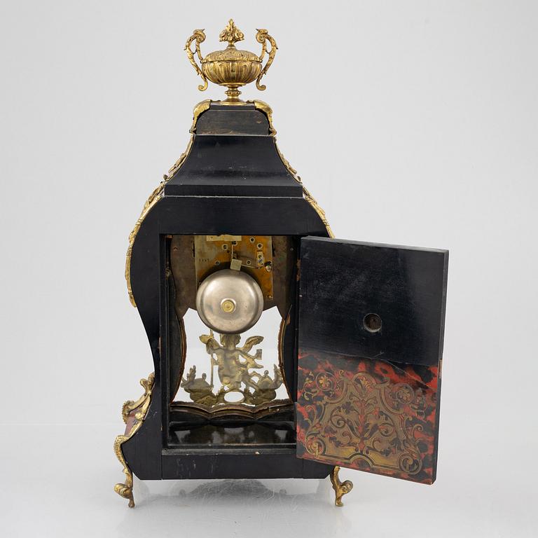 A Louis-XV style mantle clock, France, 19th century.